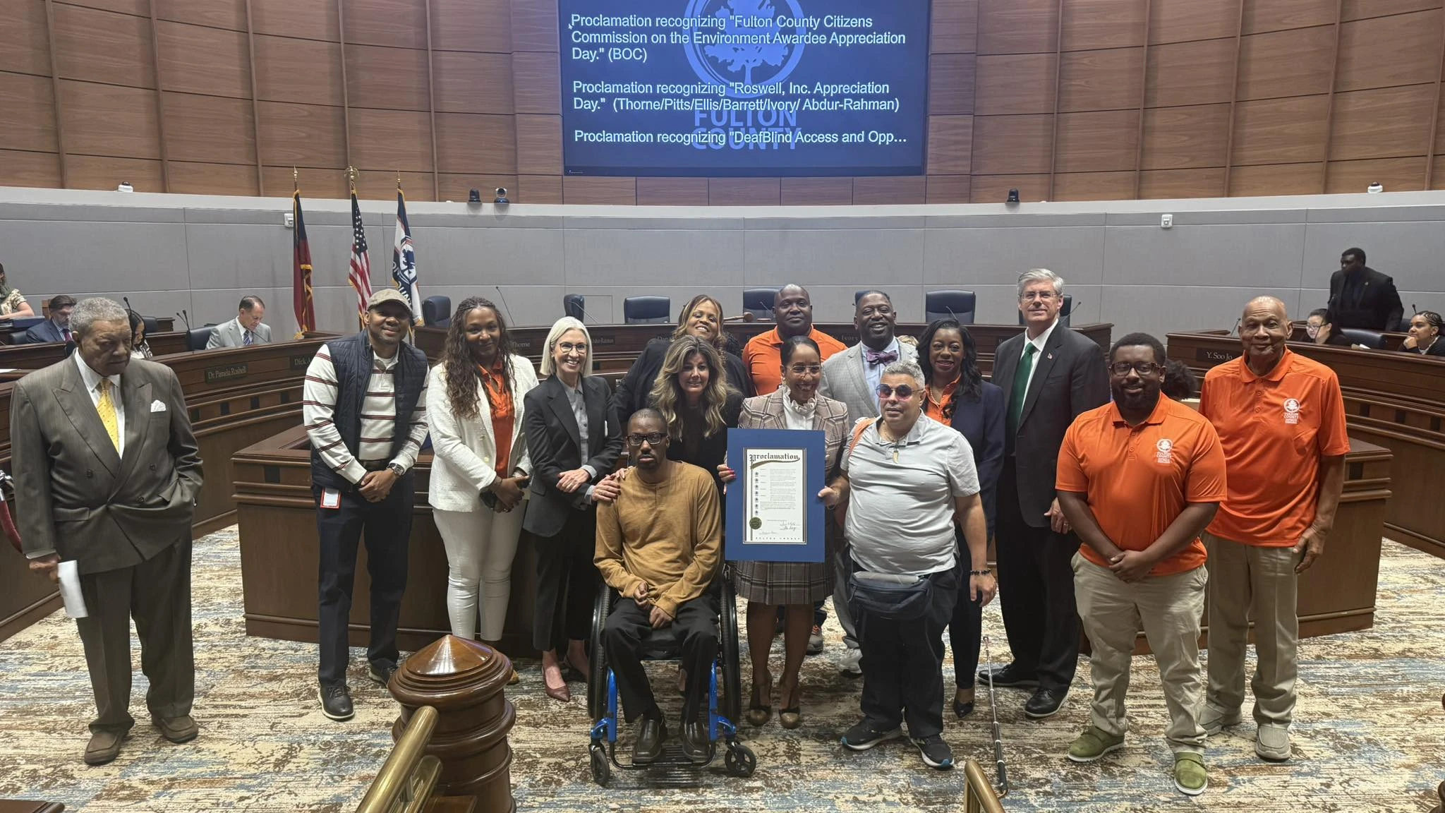 Derrick Tuff with community leaders during a Fulton County proclamation ceremony